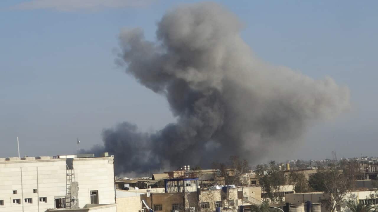 Smoke rises from Islamic State positions in Ramadi