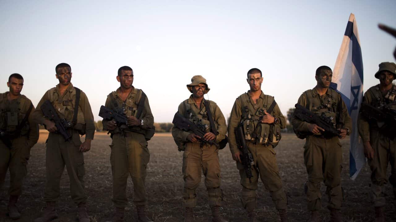 Israeli soldiers posing after graduation expedition