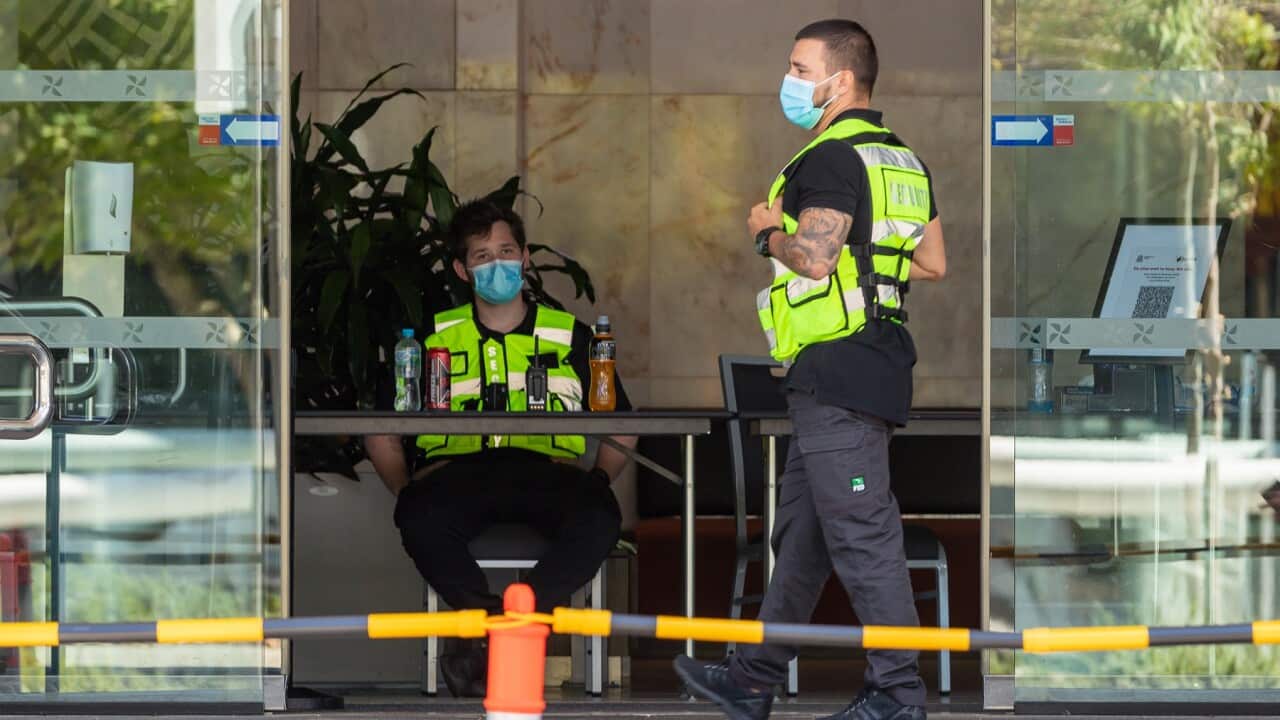 Security guards are seen at the Four Points Sheraton hotel in Perth.