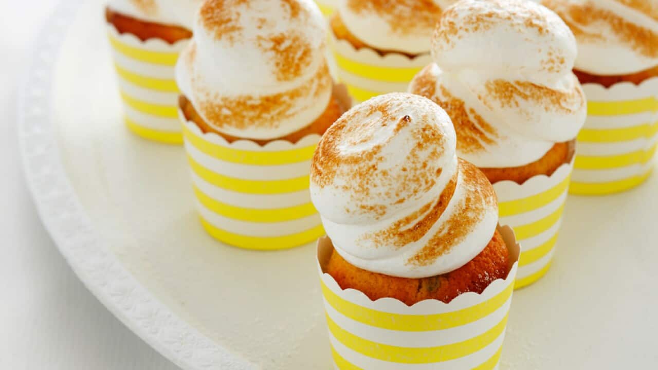 Coconut and passionfruit cupcakes with meringue frosting