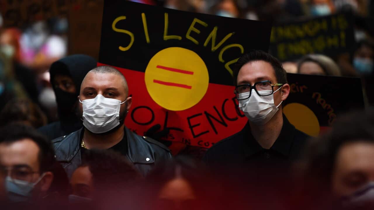 Demonstrators display a powerful message at a protest