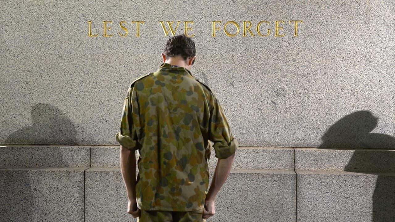A soldier at the Sydney Cenotaph in Martin Place.