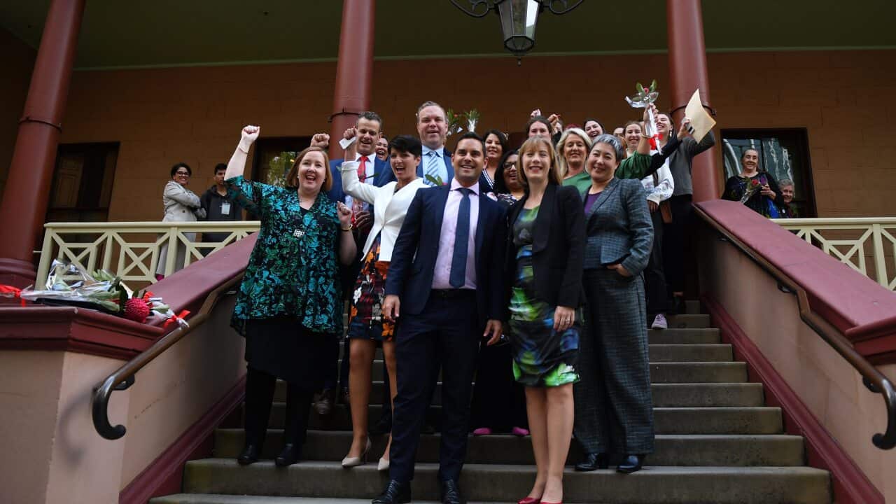 Co-sponsors of the bill celebrate after the passing of the amended Abortion Law Reform Act.