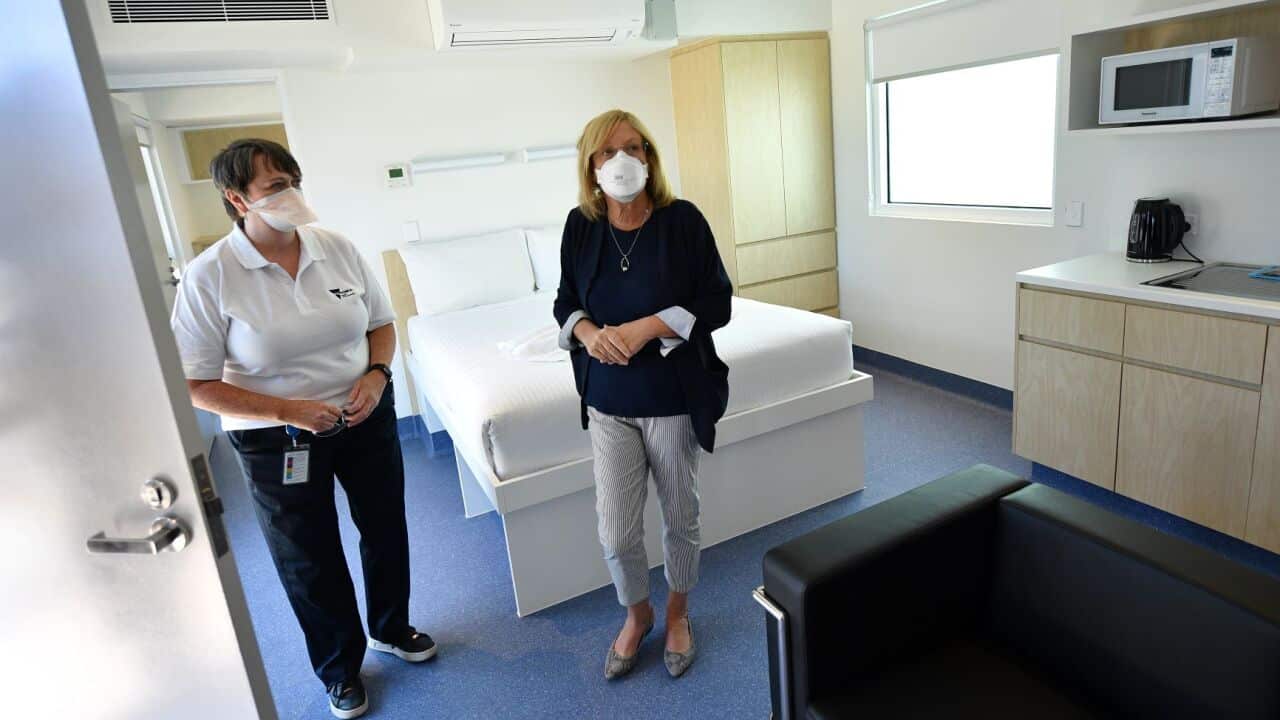 Lisa Neville (right) tours the newly constructed Victorian quarantine accommodation hub in Mickleham