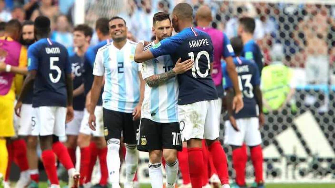 One of the stars of World Cup 2018, Kylian Mbappe, hugs Lionel Messi after the French team beat Argentina - (Getty).