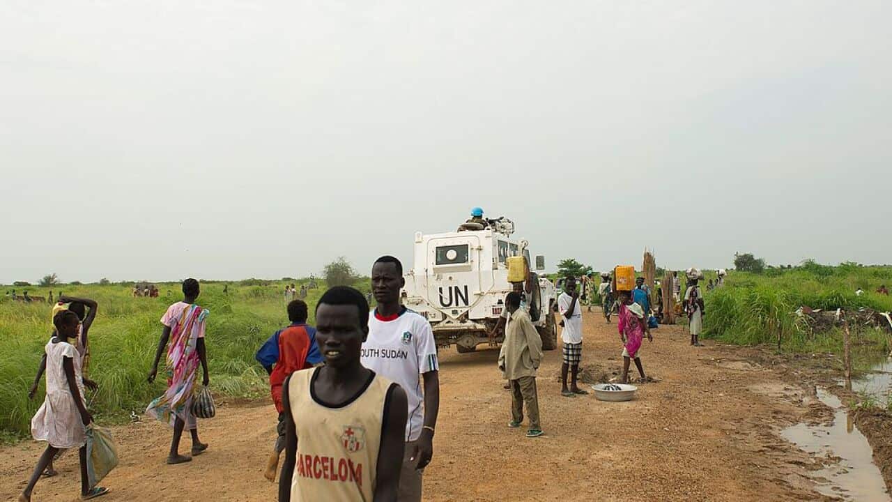 truck, people walking on road