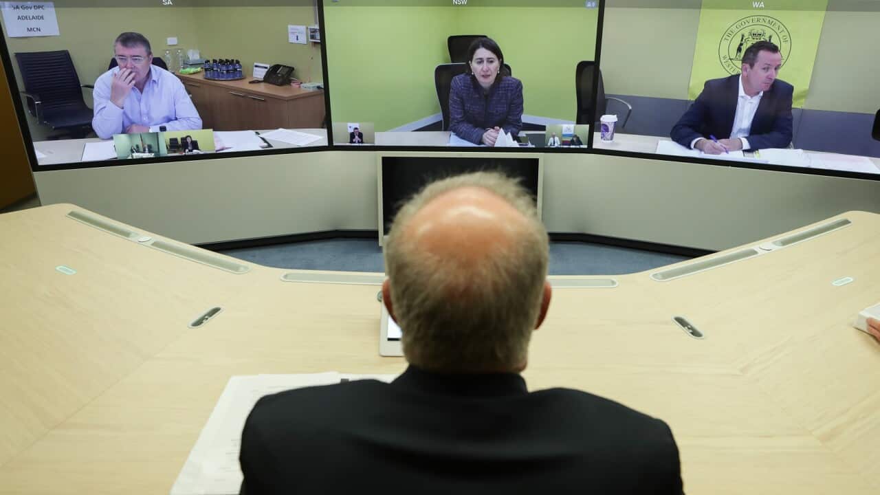PM Scott Morrison talking to NSW Premier Gladys Berejiklian at the National Cabinet