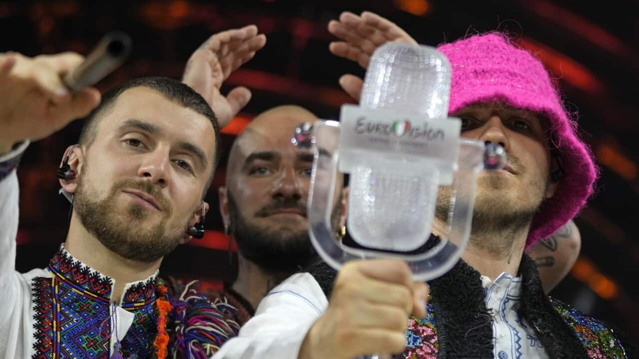 Members of the Kalush Orchestra from Ukraine celebrate after winning the Grand Final of the Eurovision Song Contest at Palaolimpico arena, in Turin, Italy, Saturday, May 14, 2022. (AP Photo/Luca Bruno)