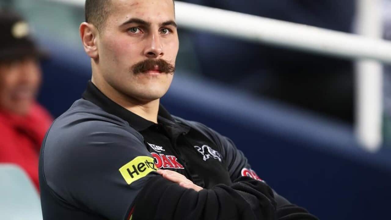 Reagan Campbell-Gillard of the Panthers looks on from the grandstand.