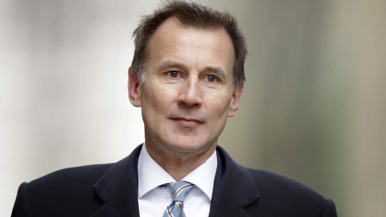Britain's Foreign Secretary Jeremy Hunt arrives for a cabinet meeting at 10 Downing Street.