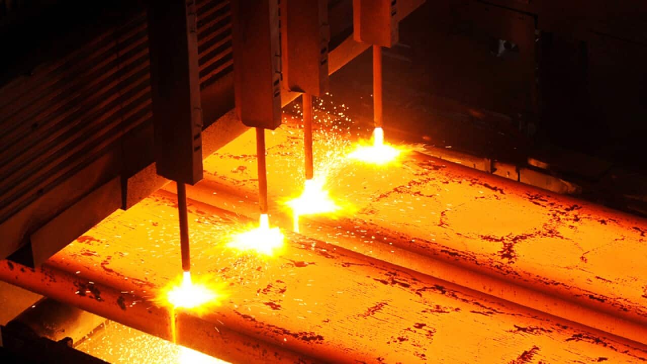 Steel is cut into slabs at the BlueScope Steel plant in Port Kembla