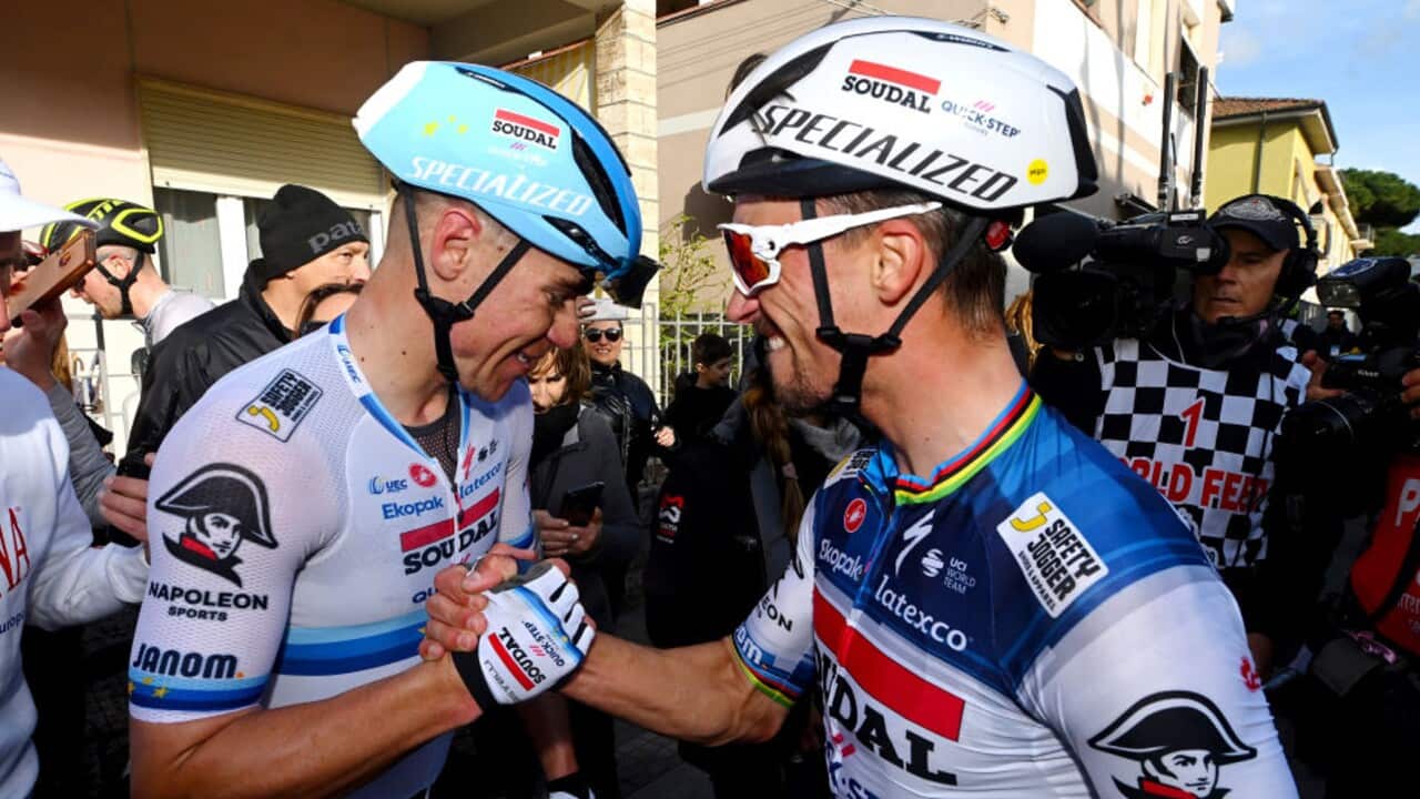 Julian Alaphilippe congratulates Soudal Quick-Step teammate Fabio Jakobsen