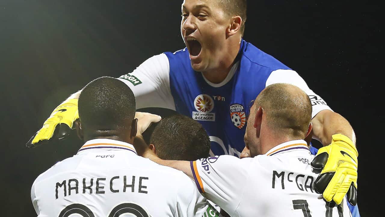 Danny Vukovic (C) in action