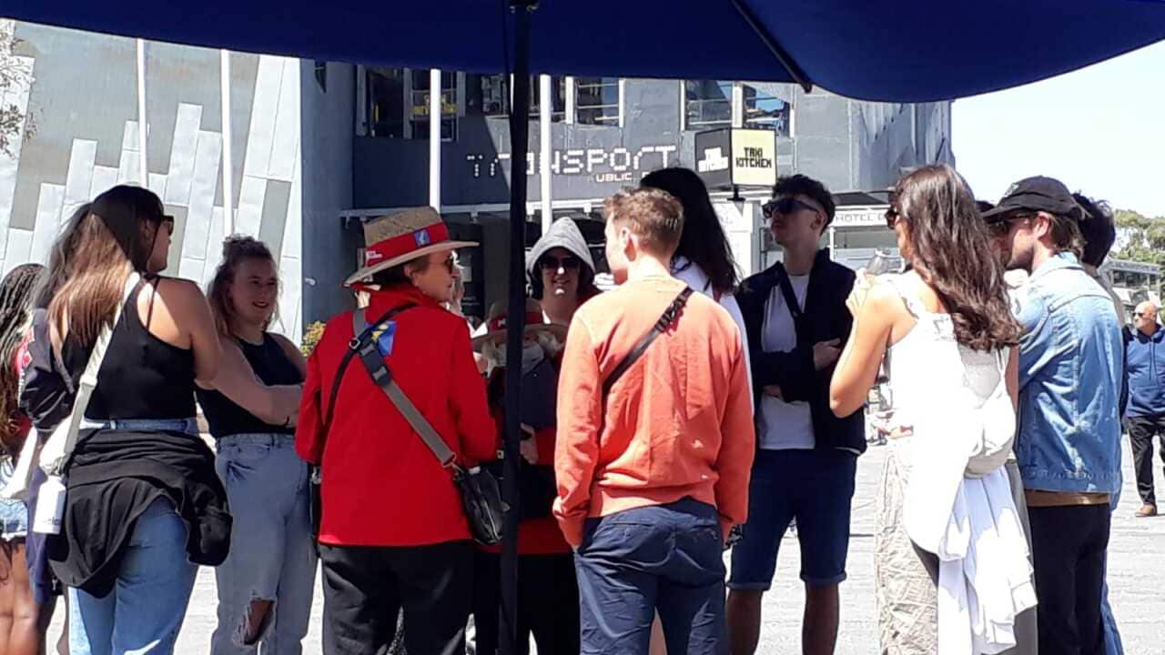 Some unknown people congregate at Federation Square in Melbourne, Feb 2023 (Courtesy: SPD).