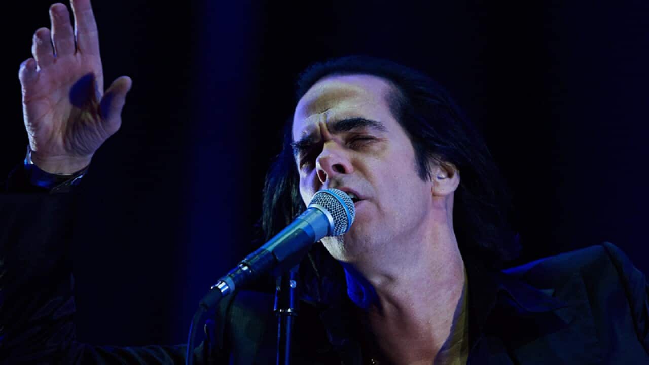 Nick Cave performs.