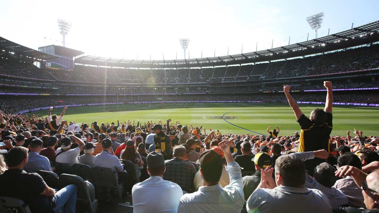 Fans during the 2019 AFL Grand Final at the MCG in Melbourne, Saturday, September 28, 2019.