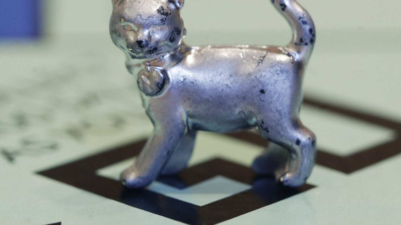 Monopoly token of a cat