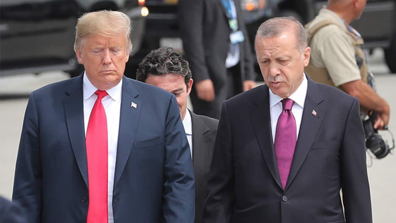 US President Donald J. Trump (L) and Turkey's President Recep Tayyip Erdogan (R) arrive for a family picture of Nato Summit in Brussels, Belgium, 11 July 2018.