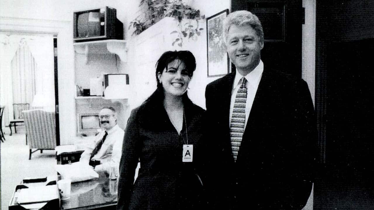 A photograph showing former White House intern Monica Lewinsky meeting President Bill Clinton at a White House function submitted as evidence in documents by the Starr investigation and released by the House Judicary committee September 21, 1998.