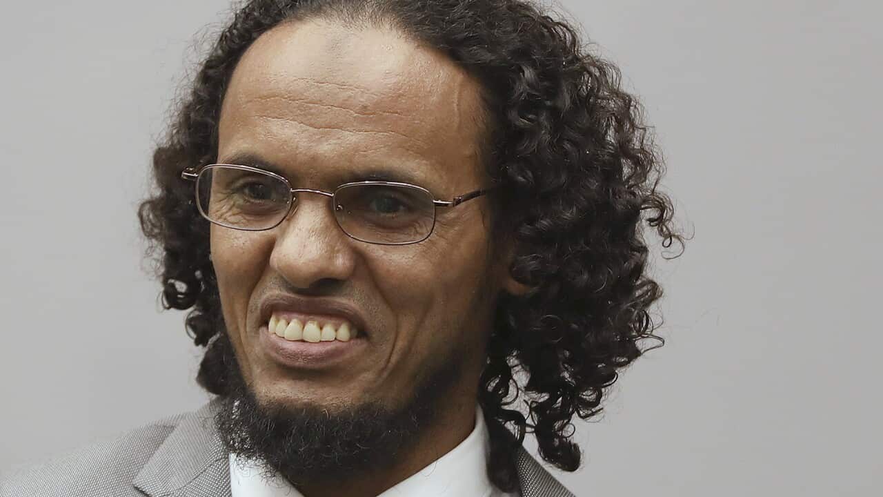 Ahmad Al Faqi Al Mahdi, right, a Malian Islamic extremist who pleaded guilty to destruction of historic mausoleums in Timbuktu.