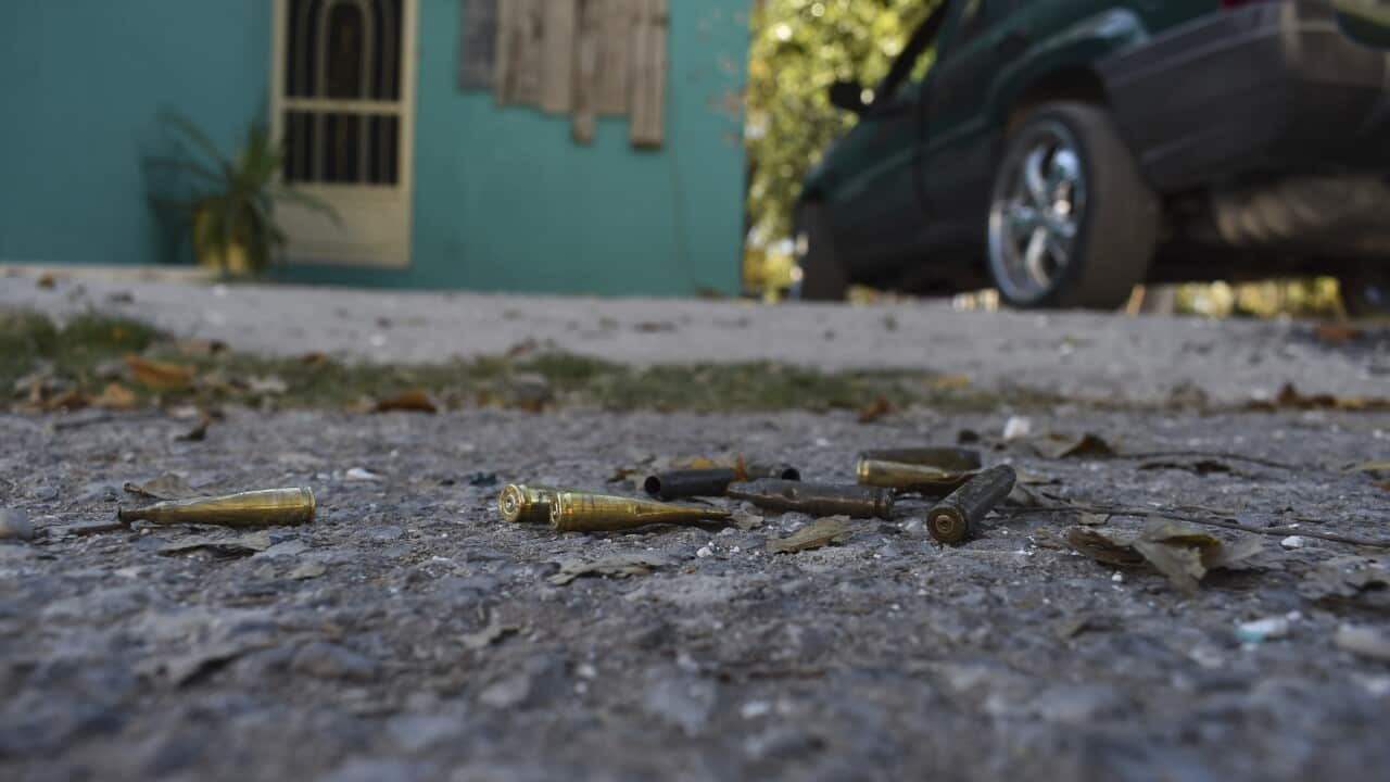 Spent bullet casings lay on the street after a gun battle between Mexican security forces and suspected cartel gunmen, in Villa Union, Mexico