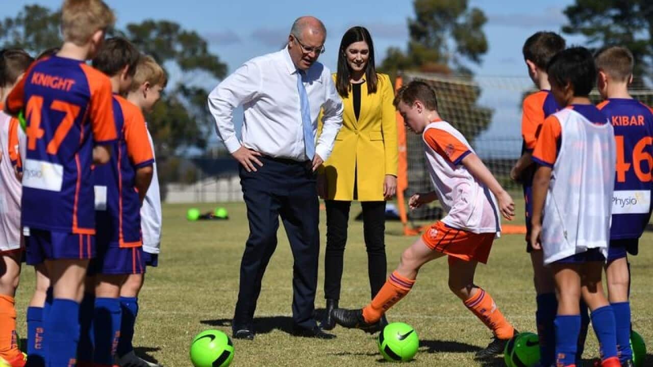 Scott Morrison and Nicolle Flint at junior soccer training.