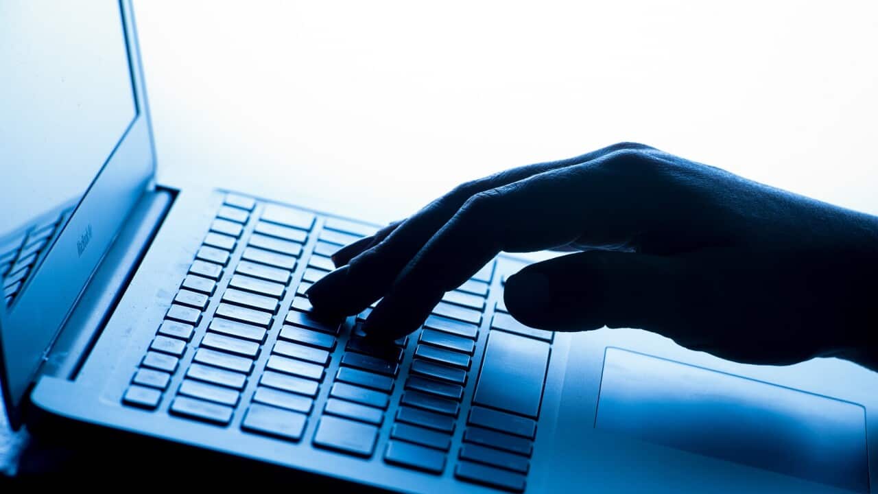 File photo of a person using a laptop.