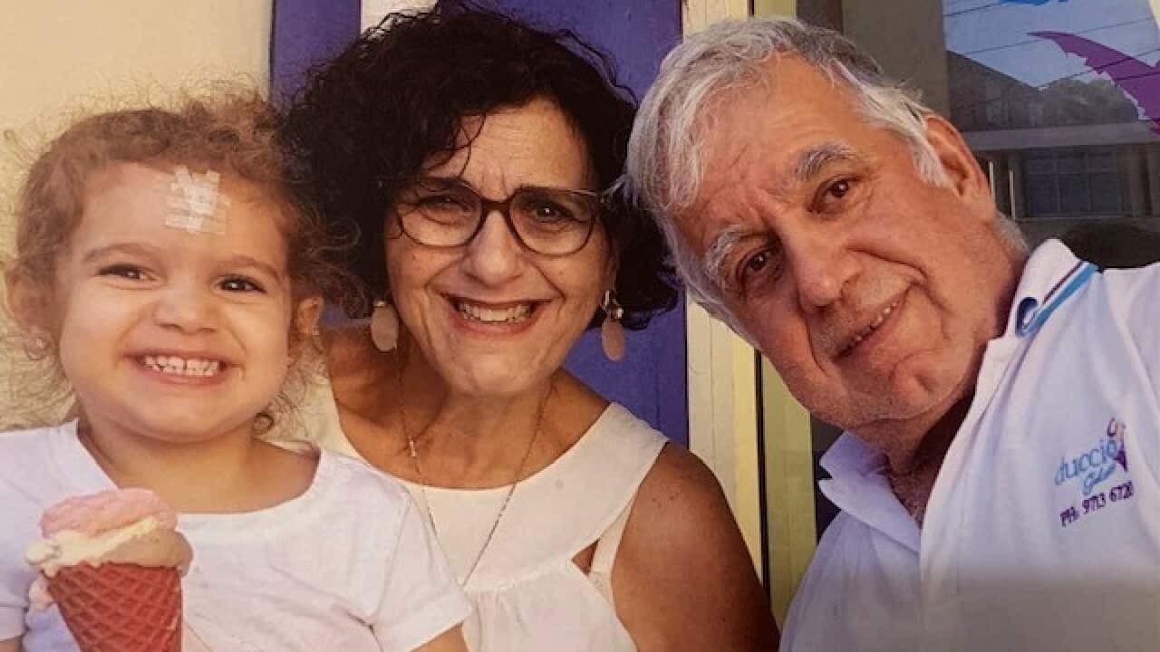 Giotto De Grazia with his wife and granddaughter