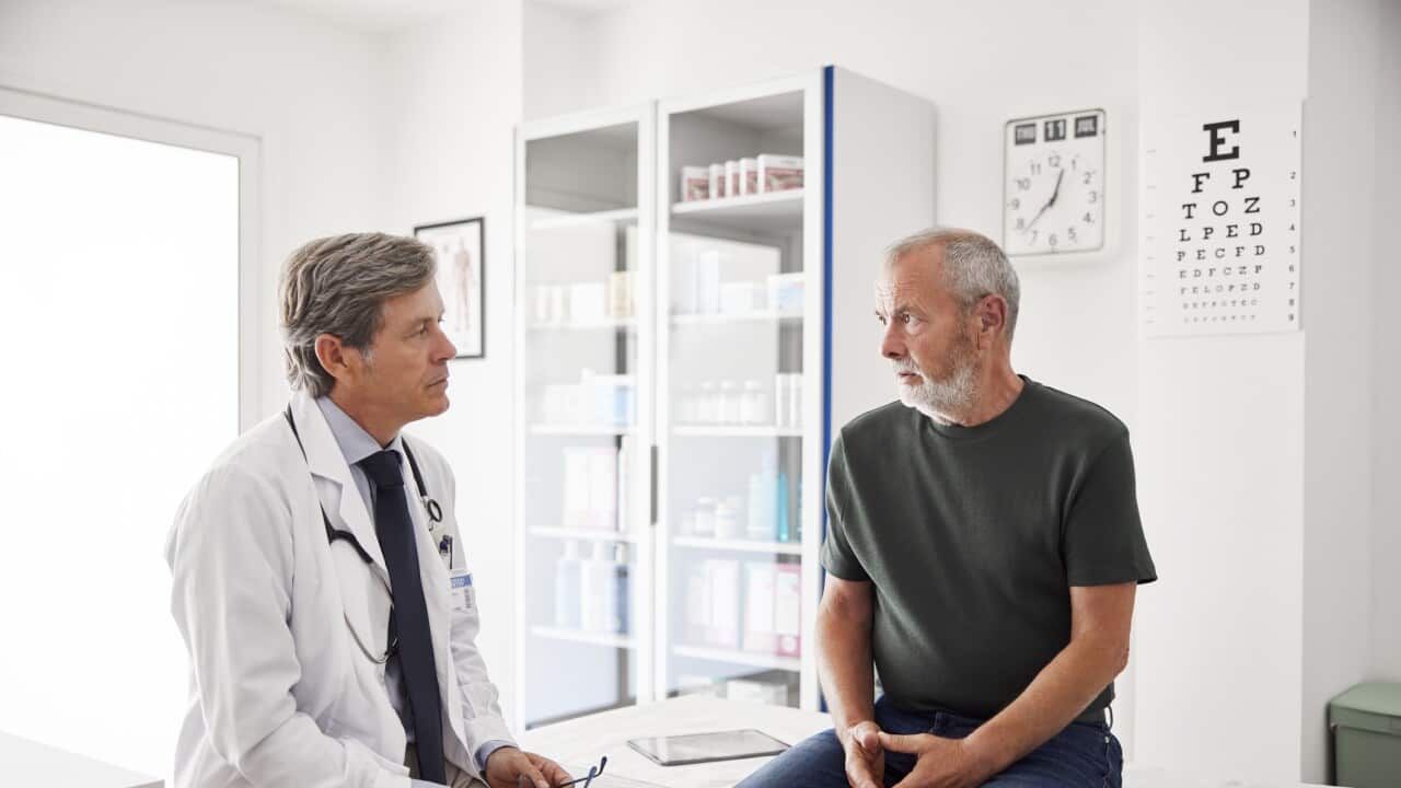 Doctor and patient talking with each other