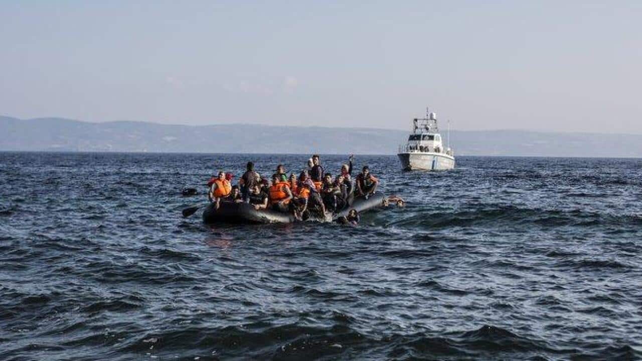 A refugee boat arrives