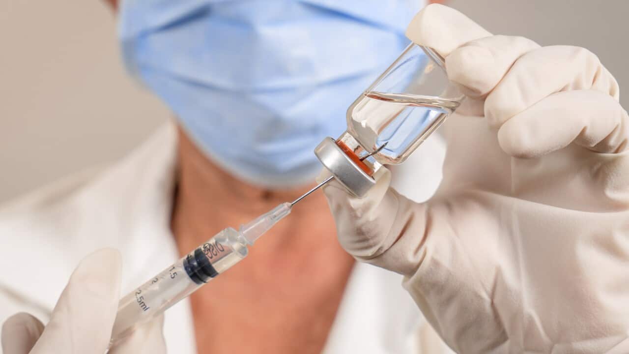 Extracting the liquid from a vaccine container