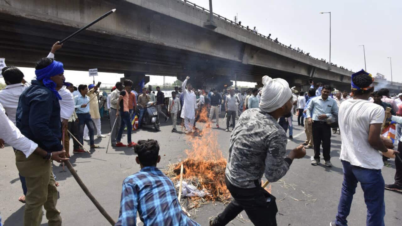 Protesters blocked the highway near Rajiv Chowk, on April 2, 2018 in Gurgaon, India.