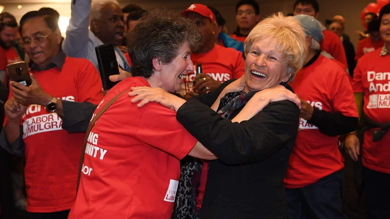 Labor supporters congratulating themselves after landslide victory.