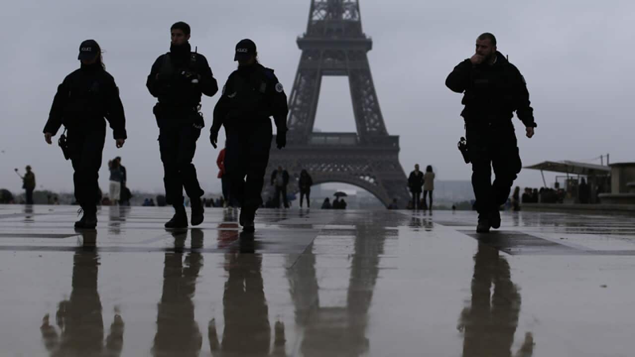 French police officers patrol on the esplanade of the Trocadero