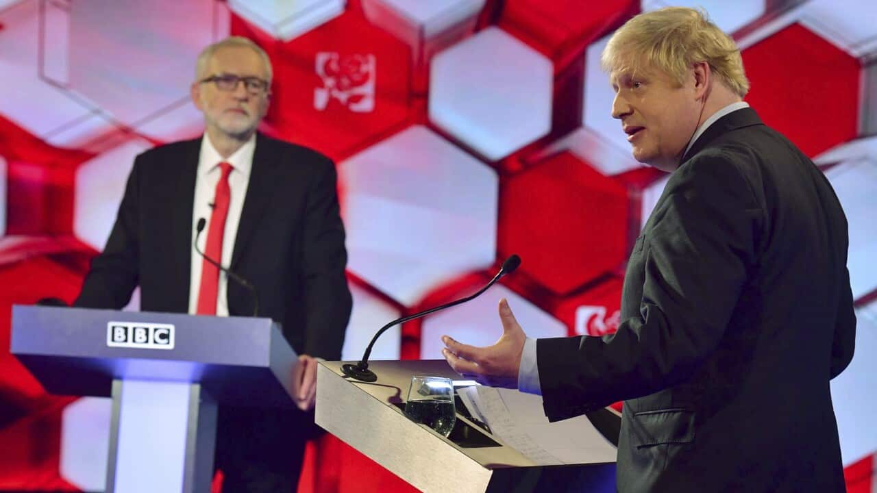 Opposition Labour Party leader Jeremy Corbyn, left, and Britain's Prime Minister Boris Johnson, during a head to head live Election Debate.