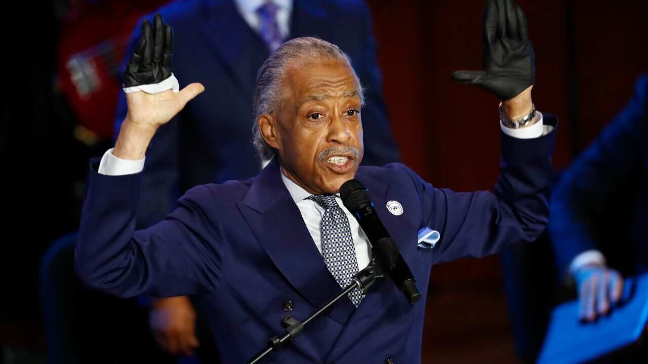 The Rev. Al Sharpton speaks at a memorial service for George Floyd at North Central University Thursday, June 4, 2020, in Minneapolis. (AP Photo/Julio Cortez)