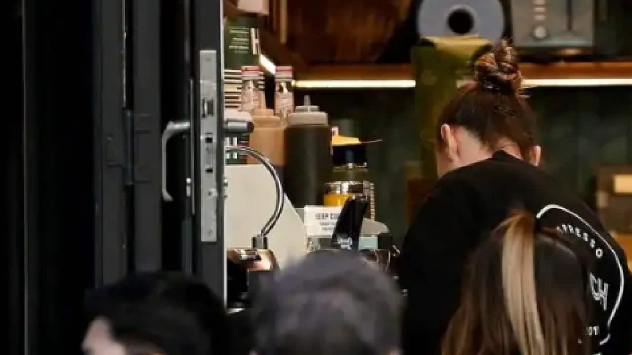 Hospitality workers in the central business district of Sydney. A third of businesses surveyed in June reported difficulties in finding staff.