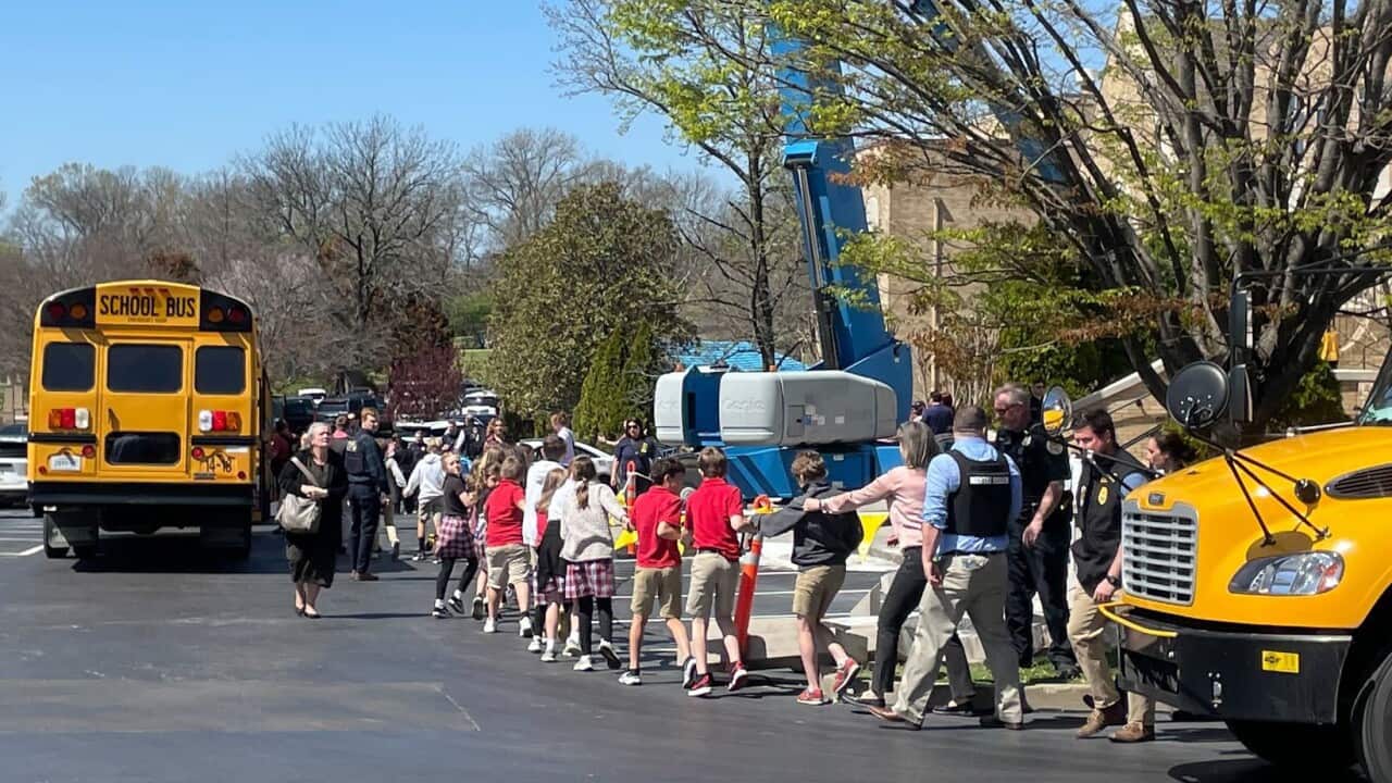 Children being led to safety by police outside their Nashville school