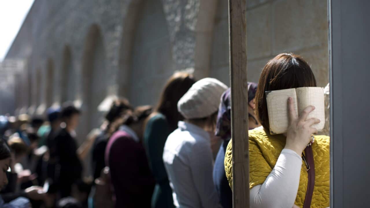 Ultra-Orthodox Jewish women pray outside Rachel's Tomb