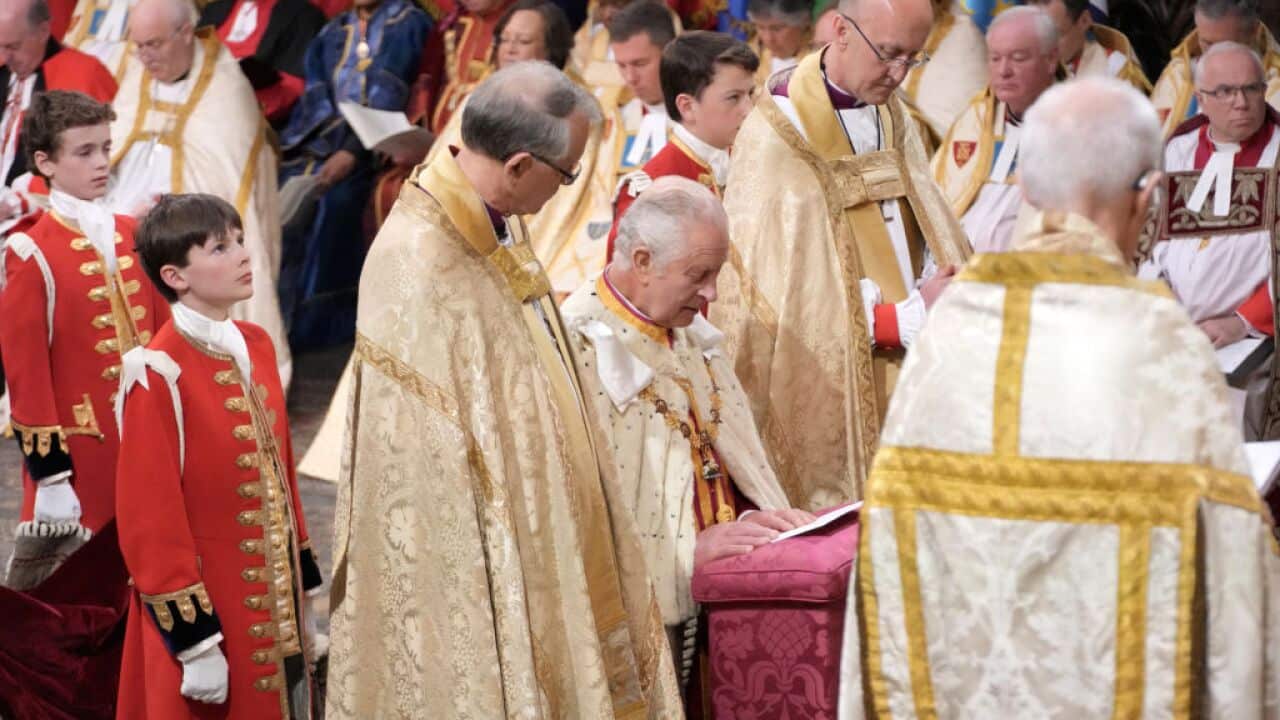 King Charles III takes part in his and Queen Camilla's coronation ceremony at Westminster Abbey.