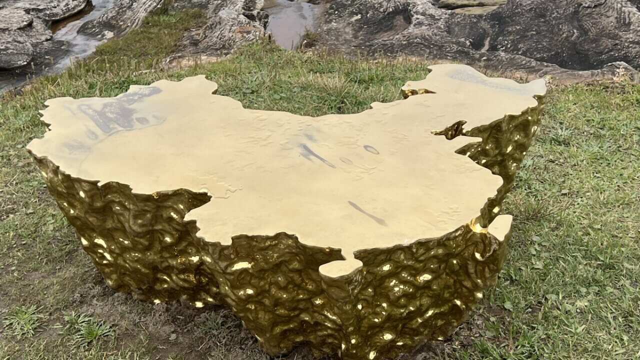 Sculpture by the Sea Mao Ling Gang’s “Earth is Flat” china map