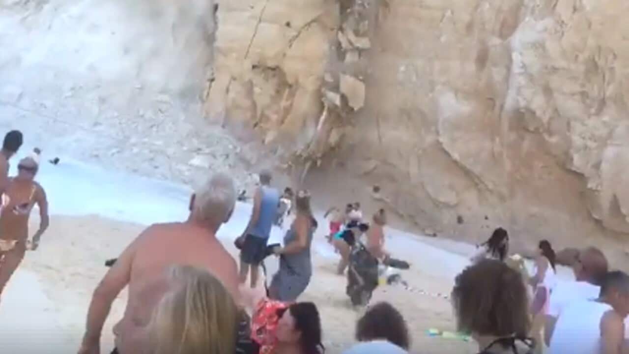 Undated handout photo taken with permission from the Facebook page of Josh O&OtildeConnell, of tourists on the Greek island of Zante scrambling to safety
