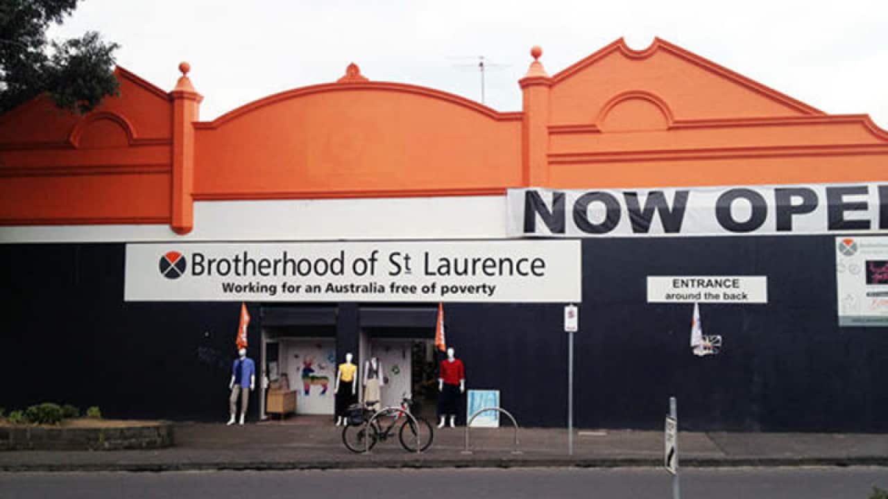 The facade of a store where a sign hanging above the entrance reads "Brotherhood of St Laurance".