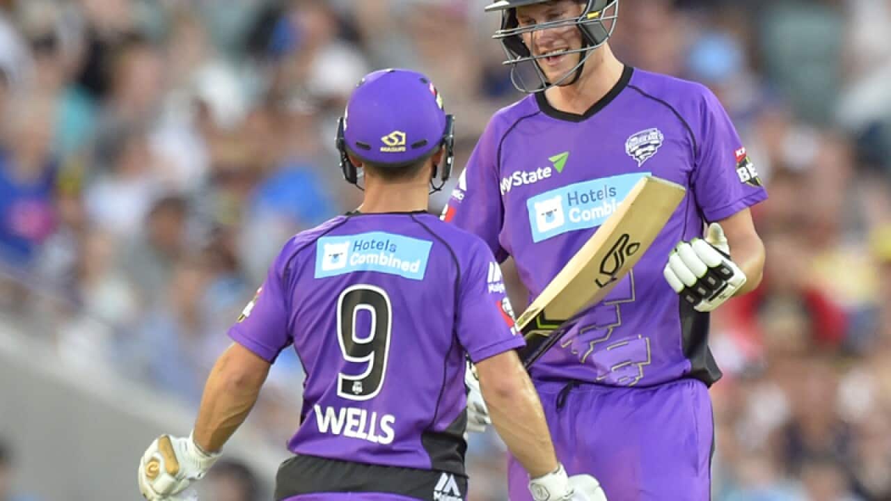 Hurricanes batsmen Jon Wells (L) and Beau Webster