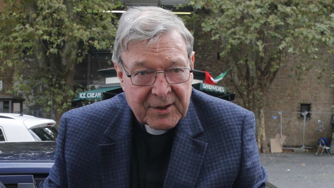 Cardinal George Pell arrives at his residence in Rome, Italy.