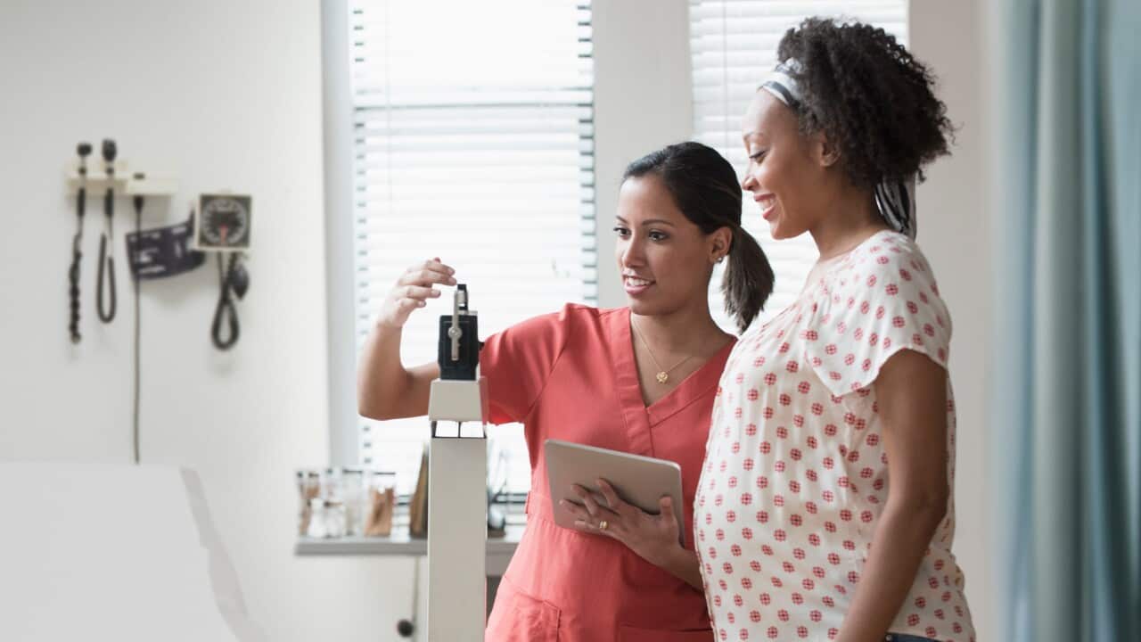 nurse pregnant woman
