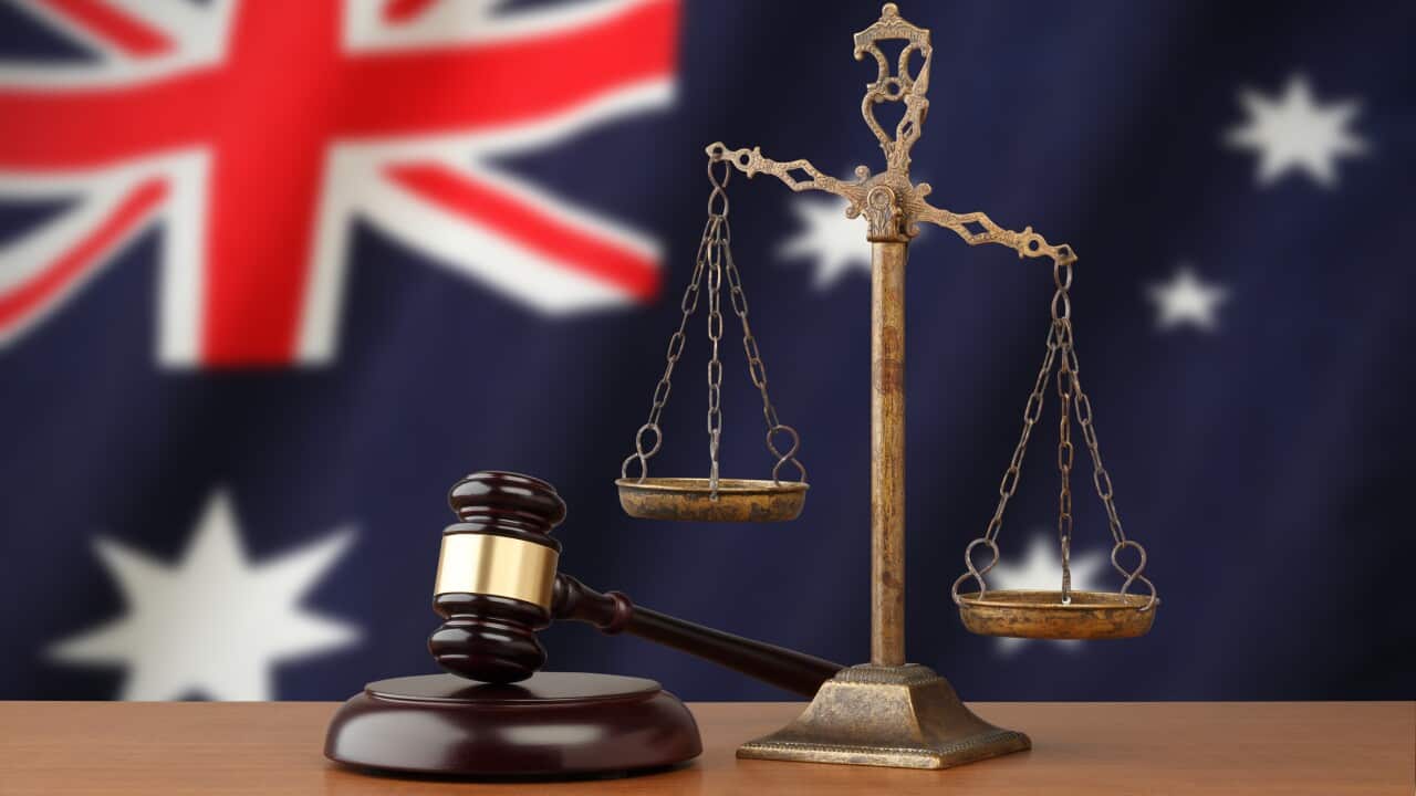 Australian flag, golden scale and judge's gavel (Getty)