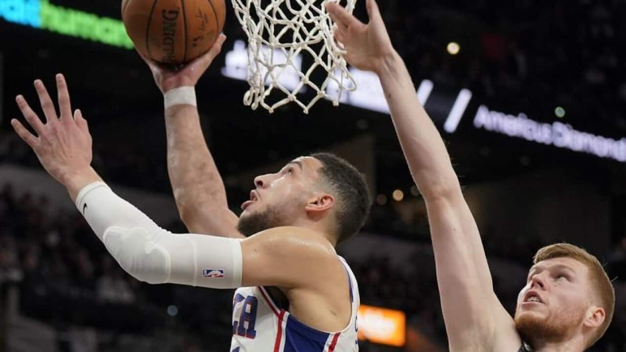 Philadelphia 76ers' Ben Simmons goes to the basket