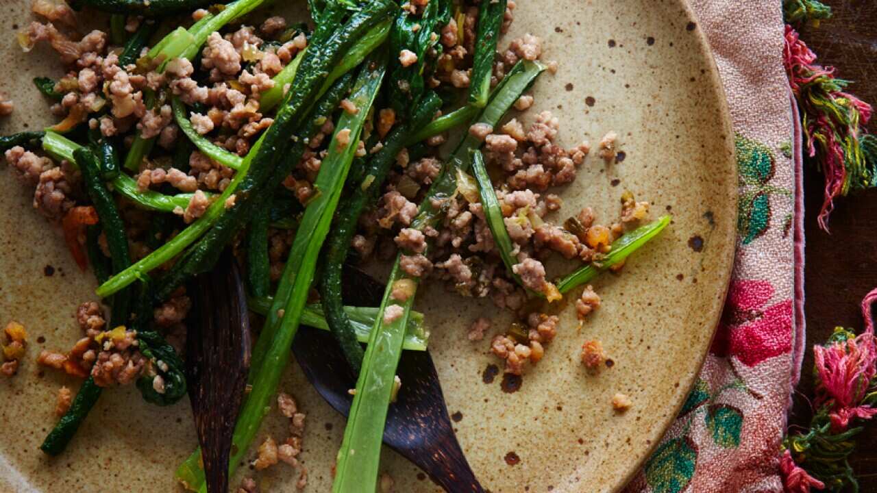Fried choy sum and snake beans with mustard greens