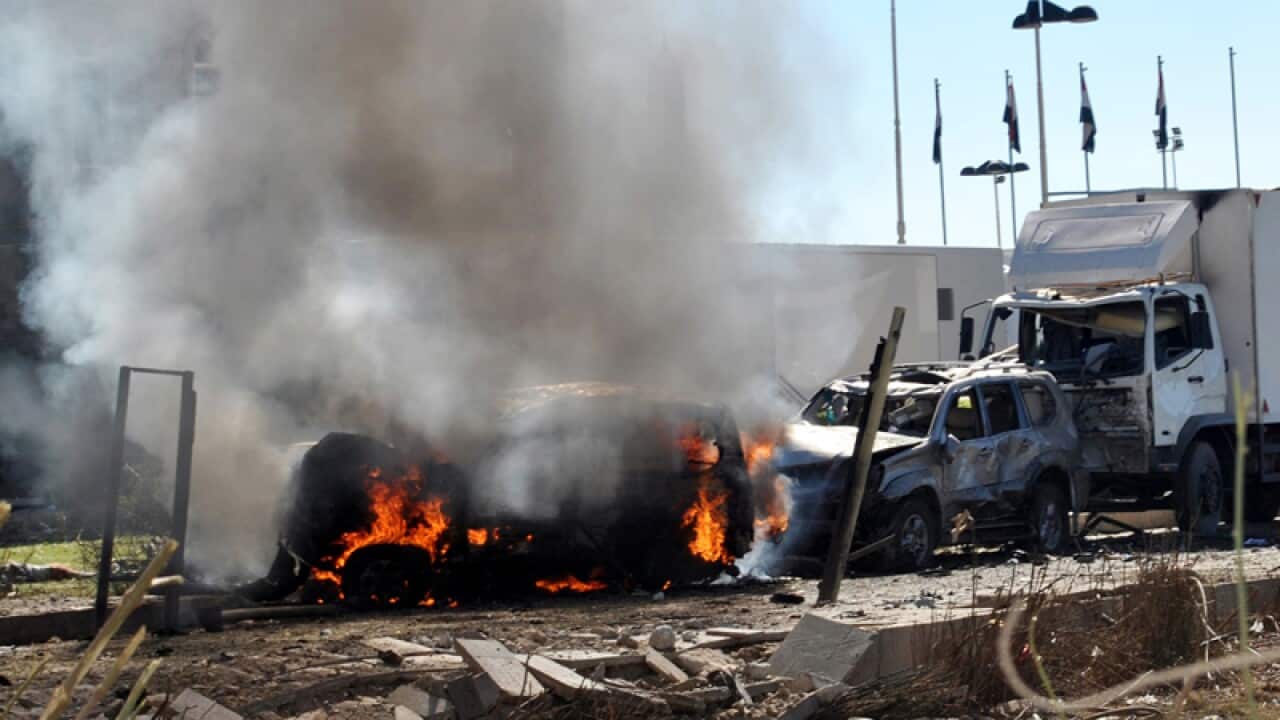 The site of a suicide car bombing in Sanaa